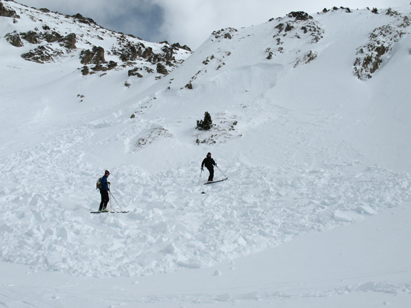 Boys checking out a fresh debris on the last descent of the race course.