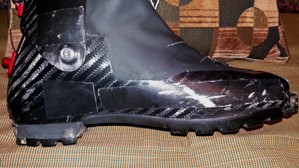 My way of protecting my boots is using black Gorilla tape on the bottom parts of the shell and other high wear places. The scratch you see in the photo was substantial but thanks to the tape the carbon was totally protected.