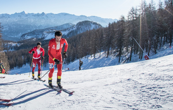 Marti Werner doing his best to stay with Kilian Jornet.